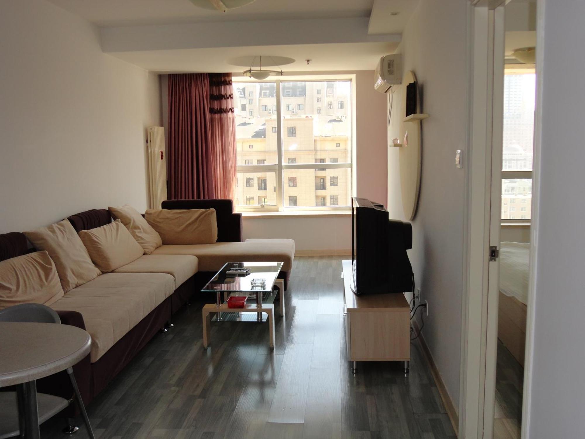 Dalian Xiuzhu Mansion Apartment Quarto foto